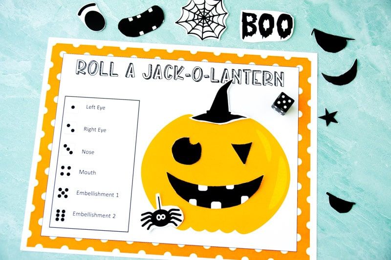 ¡Juego de Halloween para imprimir gratis para niños! ¡Vea quién puede rodar una linterna con este juego de Halloween barato y fácil para niños!